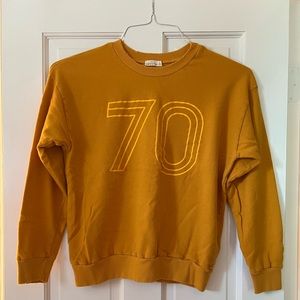 Distressed yellow 70s sweatshirt